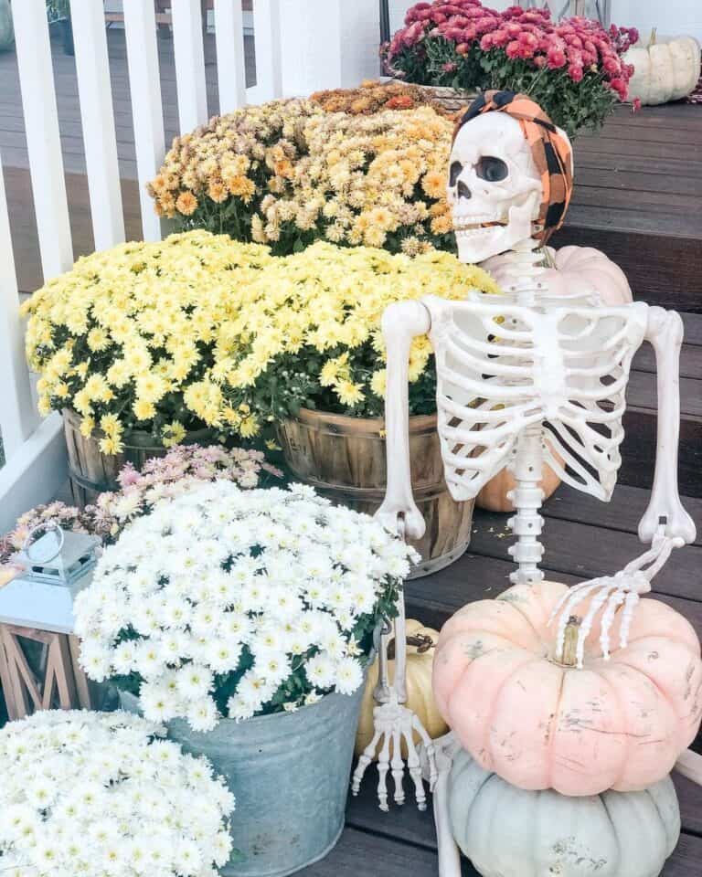 Fall Flowers and Skeleton Stair Decor
