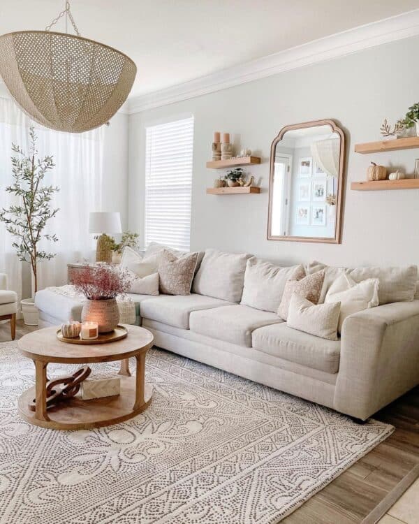 Floating Shelves Above Couch with Arched Mirror - Soul & Lane