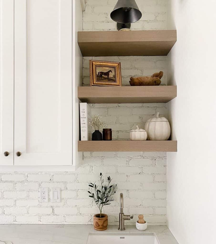 Floating Shelves and White Brick Backsplash