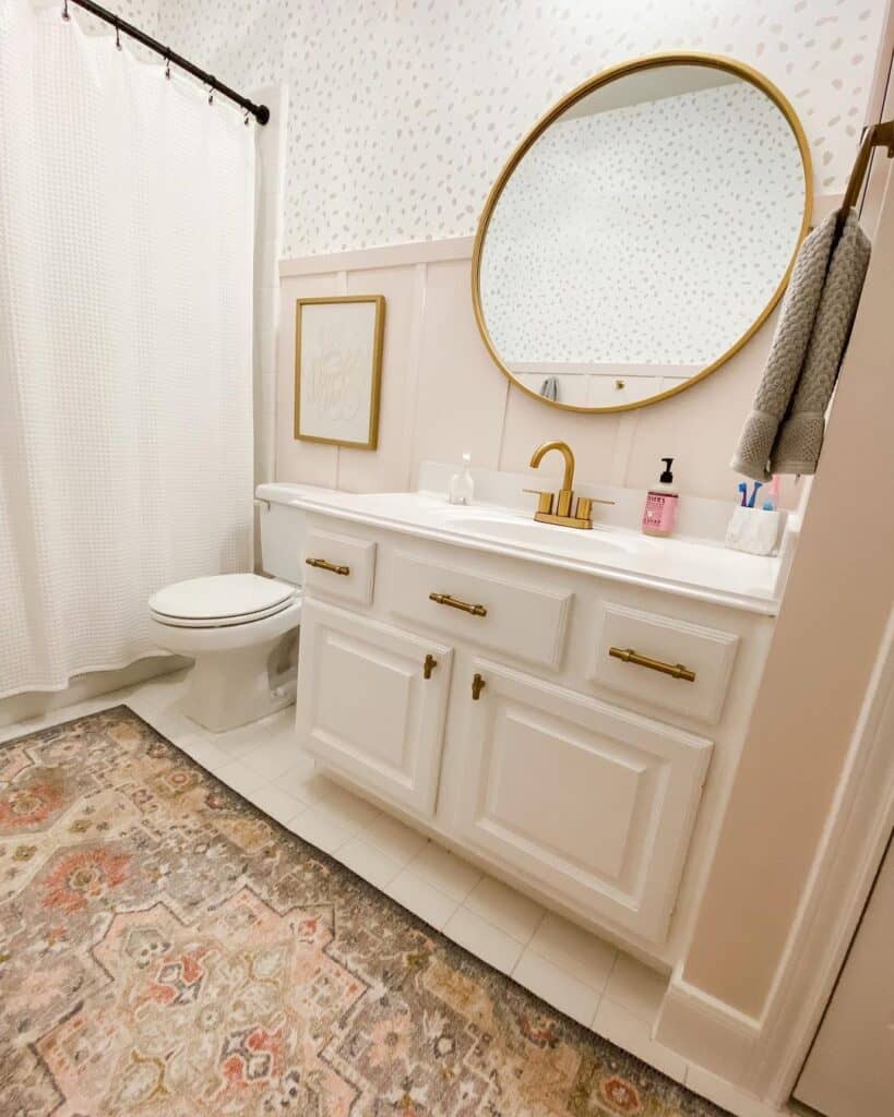 Gold Accents in Bathroom with Stenciled Wall