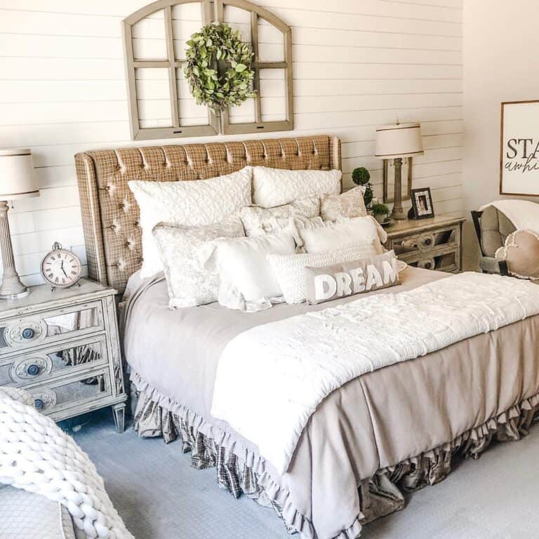 Gold Upholstered Headboard with Light Grey Bedspread