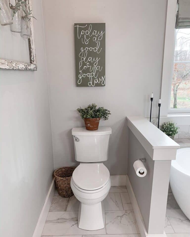 Gray Bathroom with Toilet Next to Tub