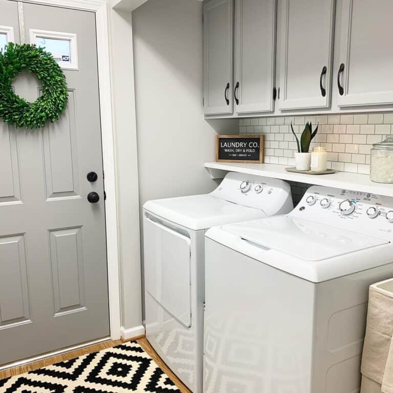 Gray Laundry Door with Green Wreath