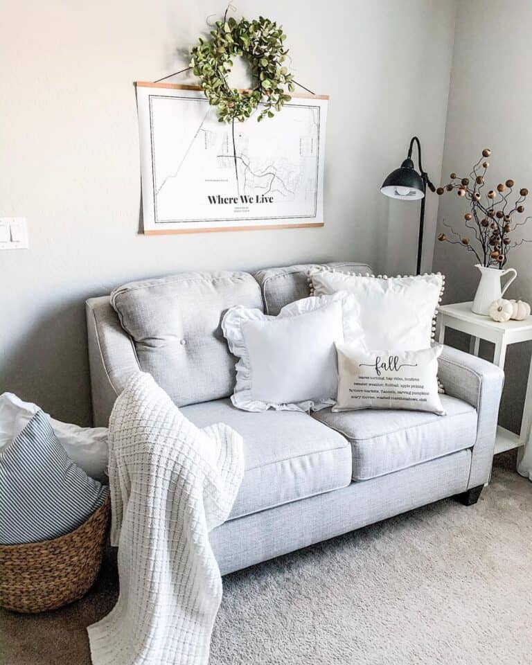 Home Office with Grey Loveseat and White Pillows