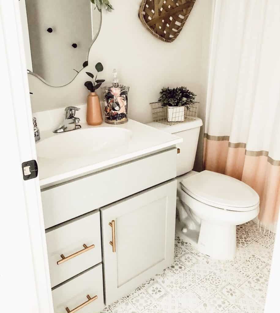 Large Brass Drawer Pulls on Light Grey Bathroom Cabinet