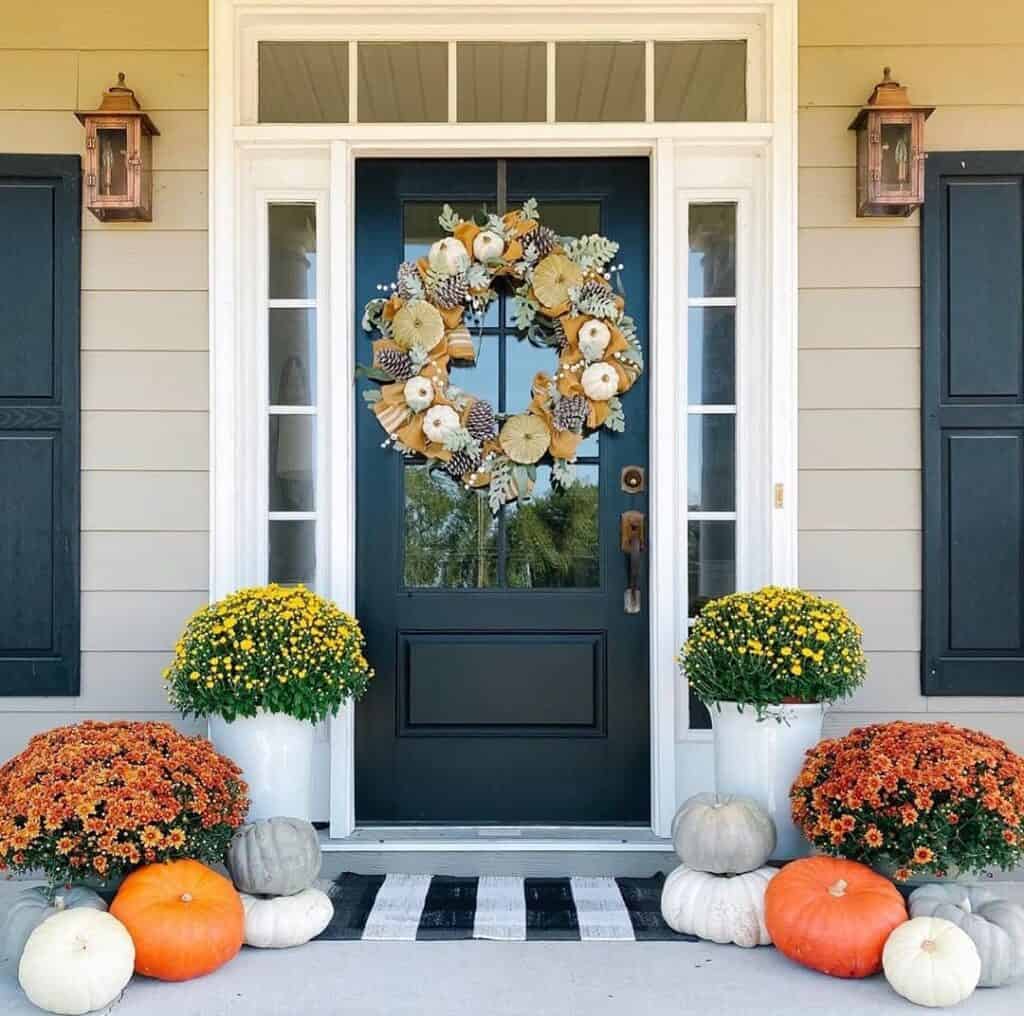 Large Wreath on Black Door with Sidelights and a Transom