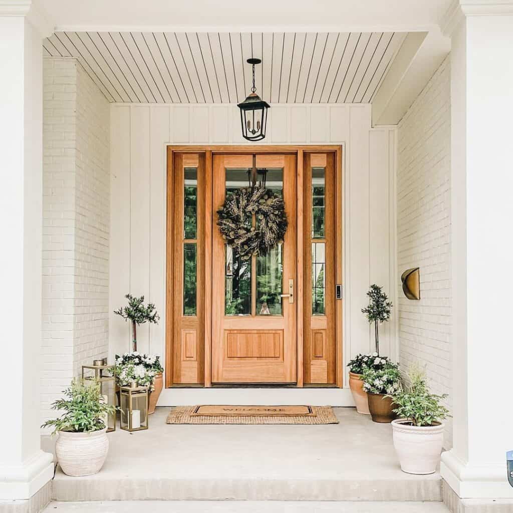 Large Wreath on Front Door With Sidelights