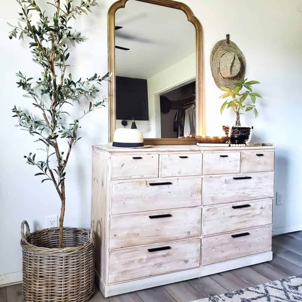 Light Wood Dresser With Large and Small Black Pulls