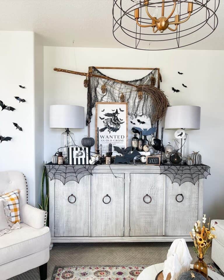 Living Room with Black Bats and a Broom