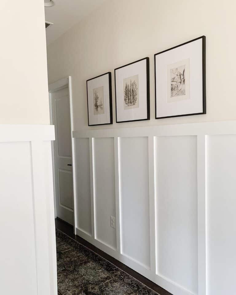 Narrow Hallway with Black Frame Gallery Art