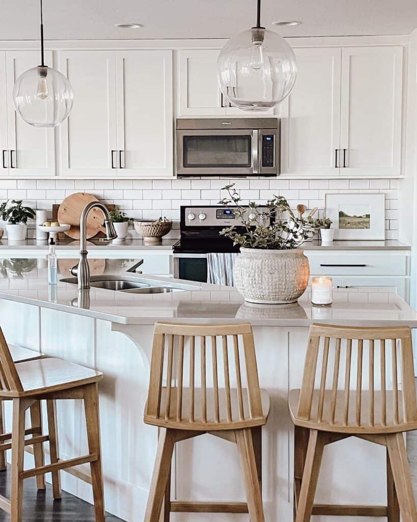 Neutral Kitchen with Glass Globe Pendants