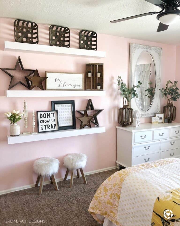 Pink Walls in White Floating Shelves Bedroom