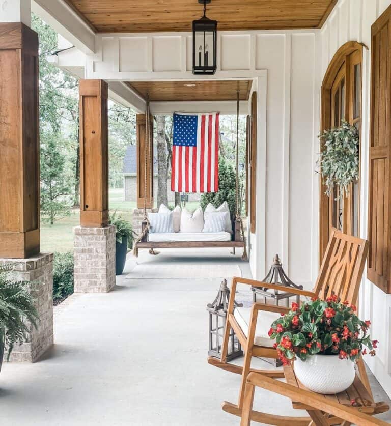 Porch Swing with Wood and Stone Columns