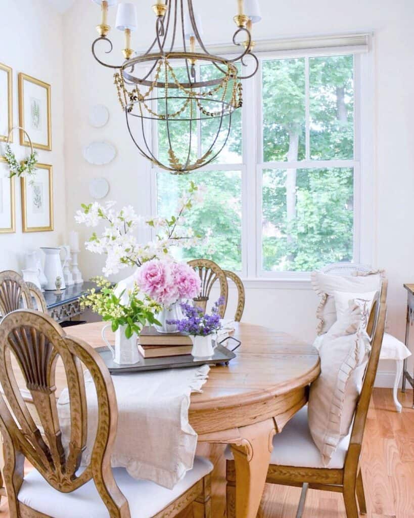 Round Dining Table with Light Wood Chairs