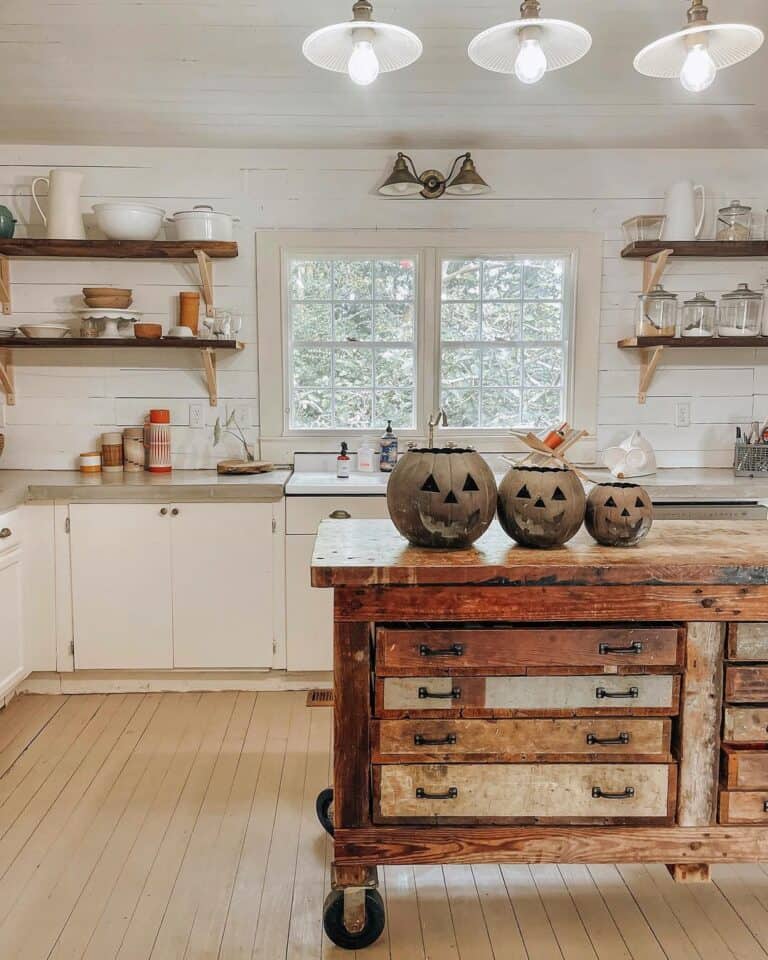 Rustic Kitchen Island with Halloween Pumpkin Faces