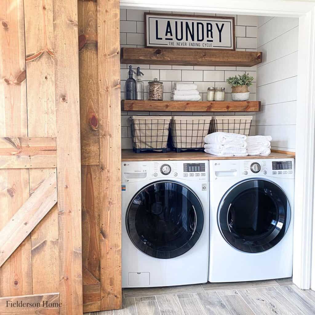 Rustic Laundry Closet with Sliding Doors