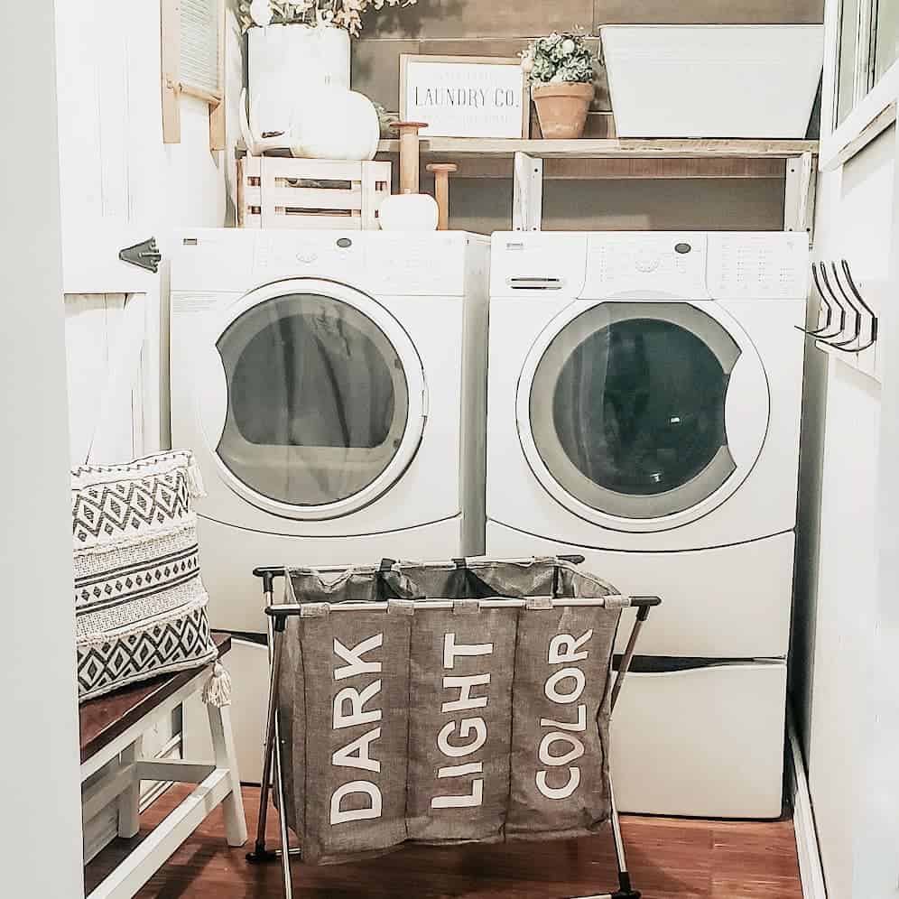 Rustic Laundry Room with White Washer and Dryer