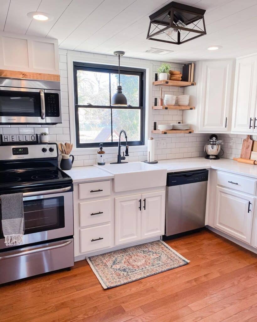 Stainless Steel Appliances in Subway Tile Kitchen