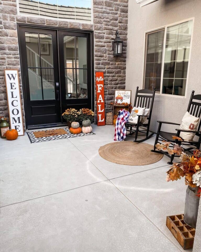 Stone Wall With Fall Front Porch Decor