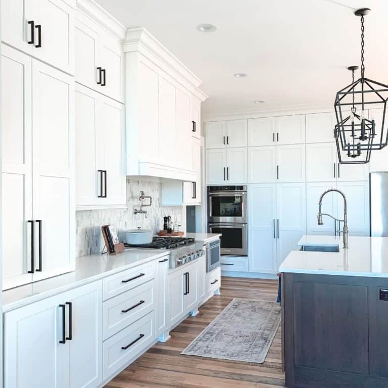 Tall White Cabinets with Long Rectangular Black Pulls