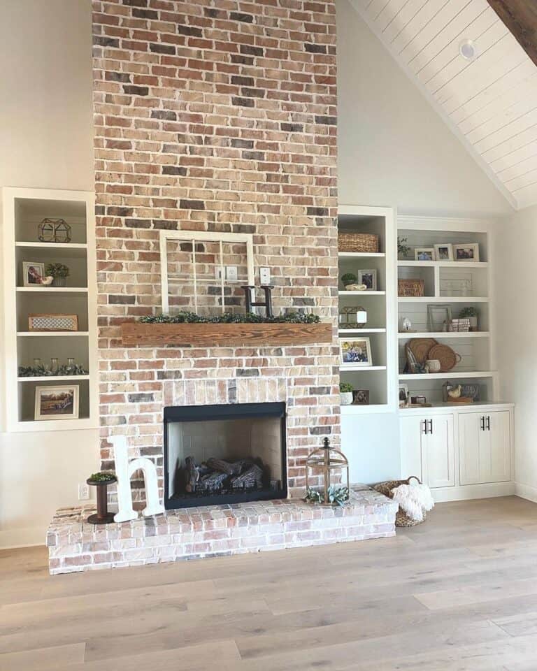 Two Story Living Room Brick Fireplace