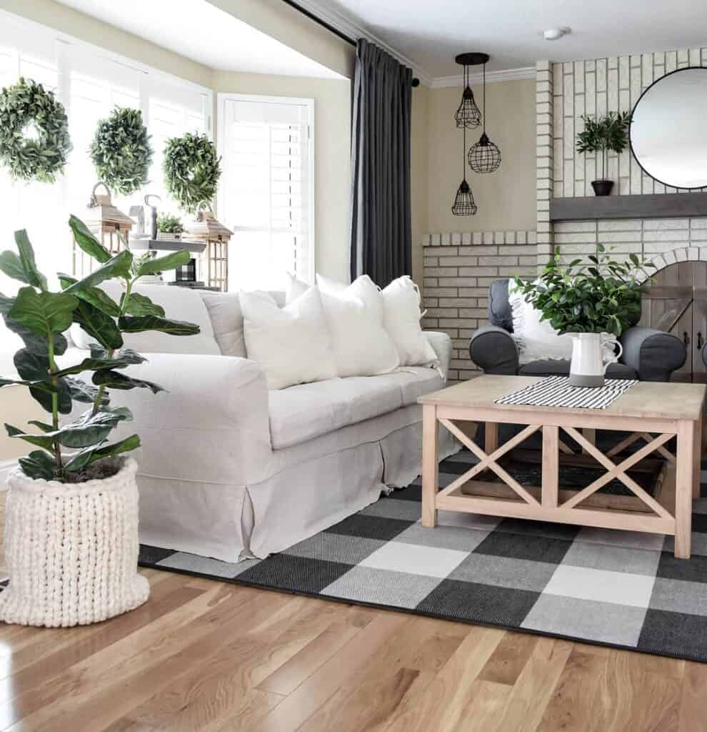 White Brick Living Room with Wreaths