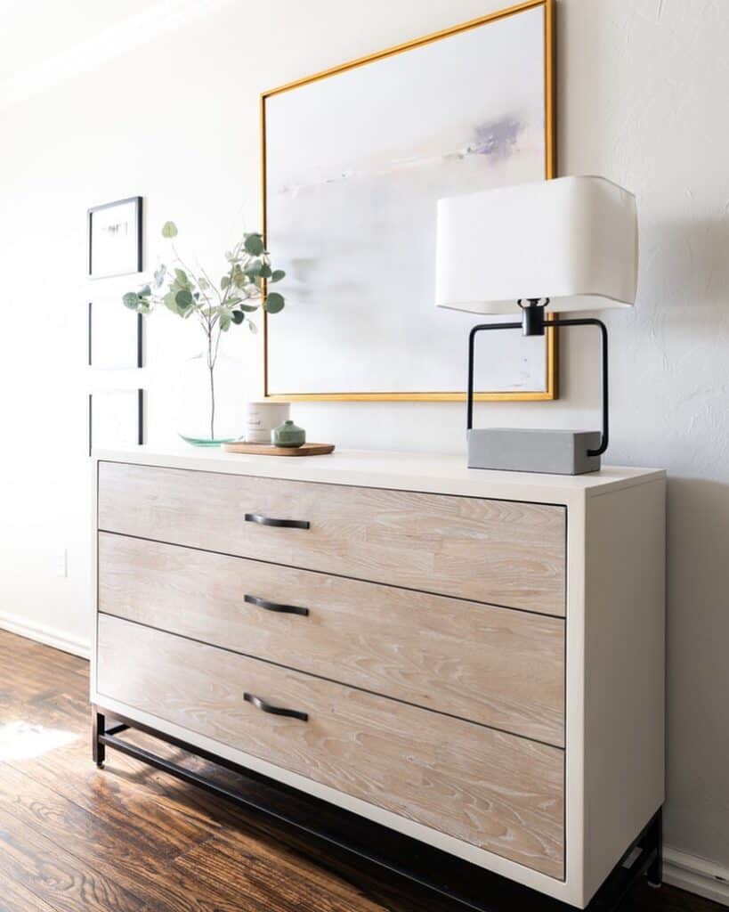 White Dresser With Wood Drawers and Rounded Black Handles