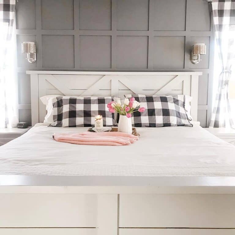 White Farmhouse Bed with Checkered Accents