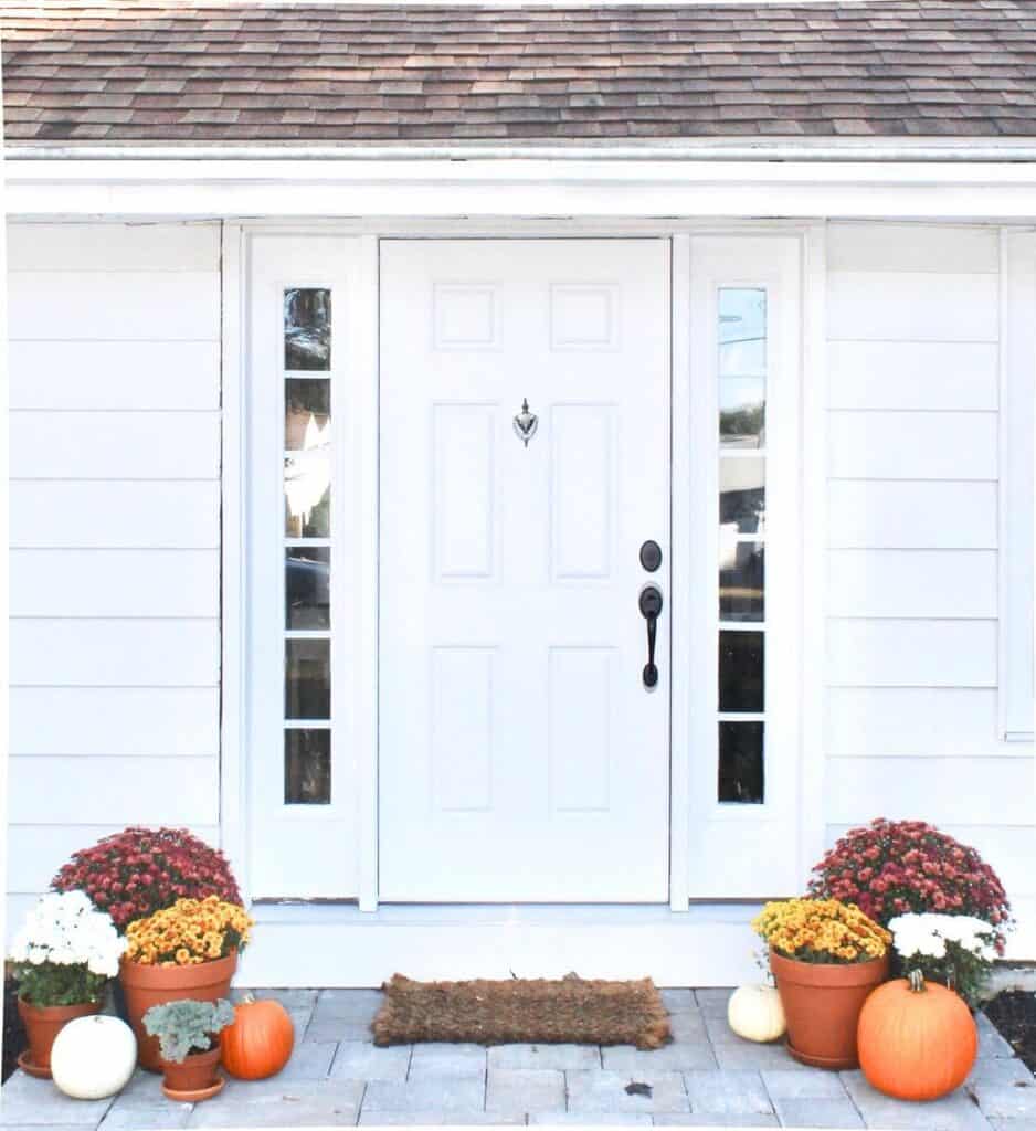 White Front Door With Sidelights on a White House