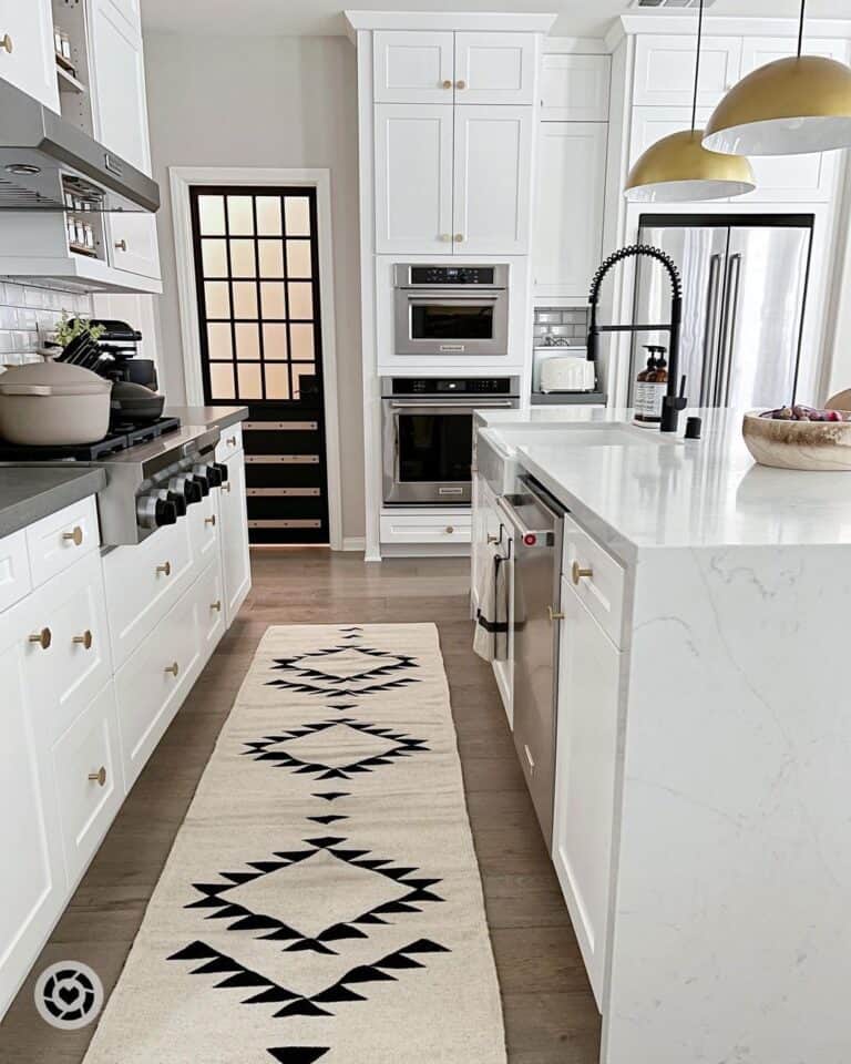 White Kitchen with Gold Pendant Lighting