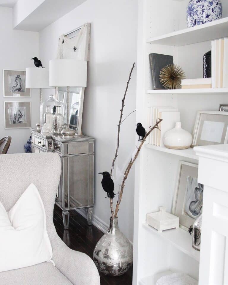 White Living Room with Black Crow Decor