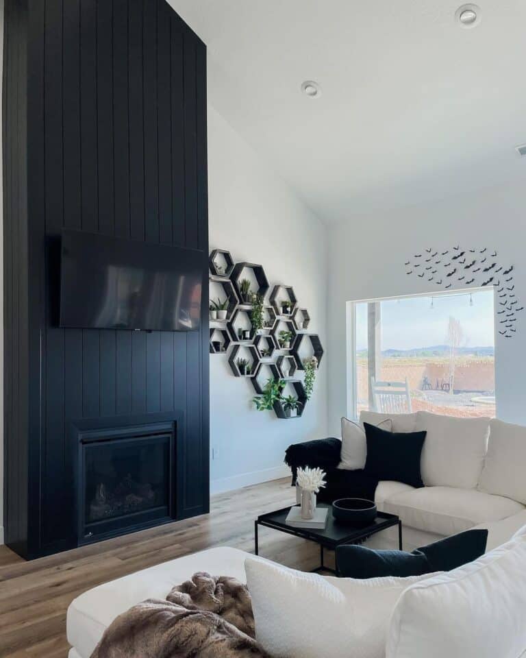 White Living Room with Black Shiplap Fireplace