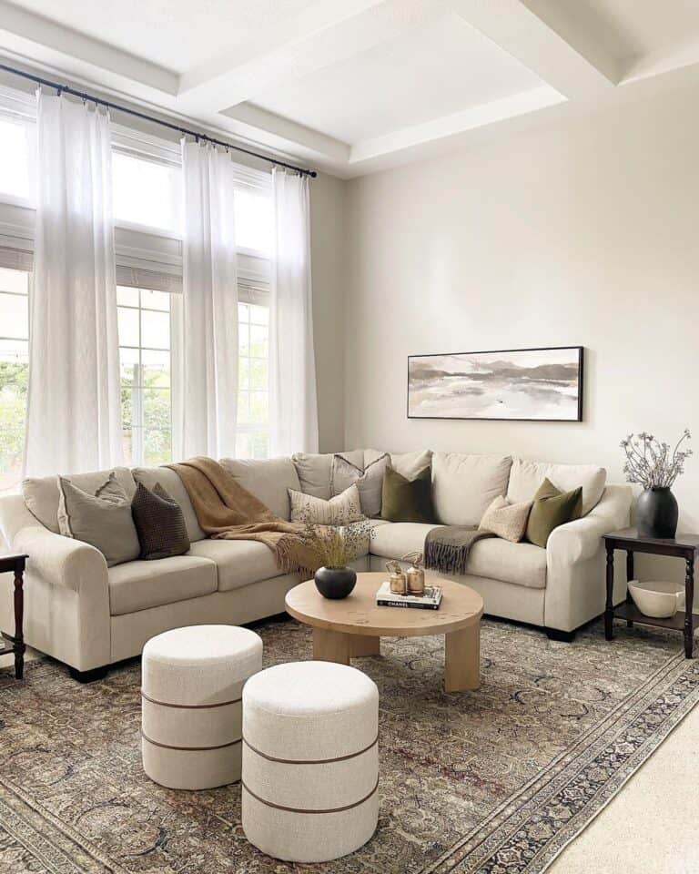 White Living Room with Gold and Brown Throw Blankets for a Couch