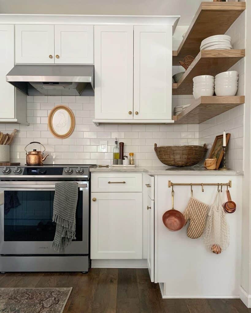 White Tiled Kitchen With Wood L-Shaped Floating Shelves