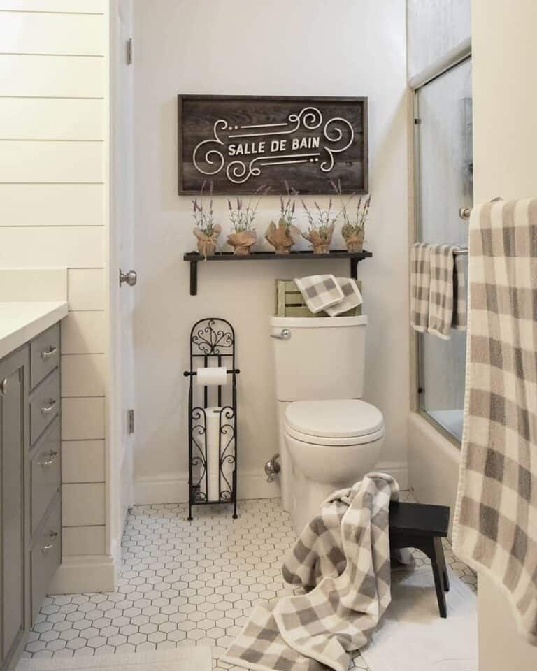 White Toilet Next to Glass Shower Door
