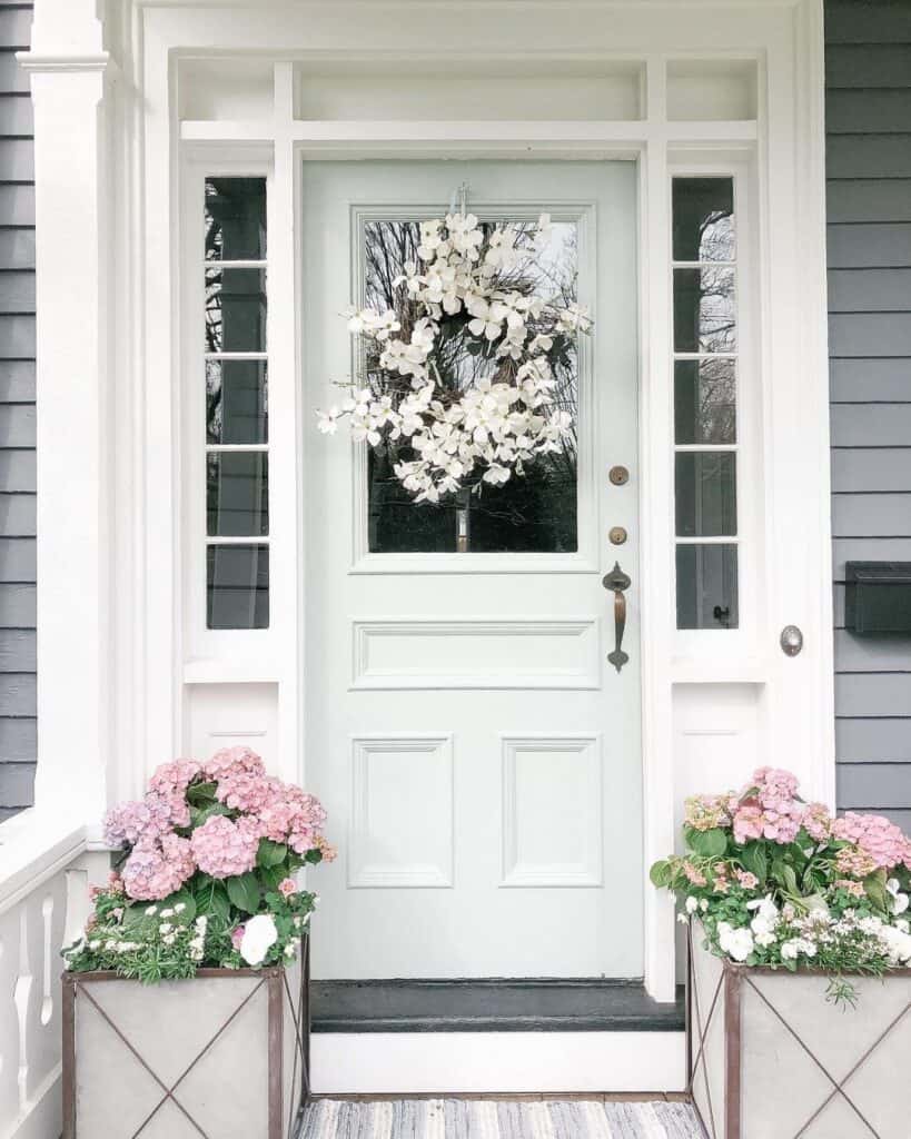 White Wreath on a White Front Door with Sidelights and Transom