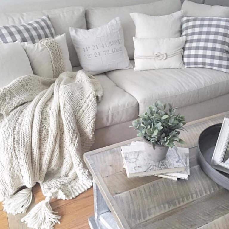 White and Grey Pillows on Grey Couch