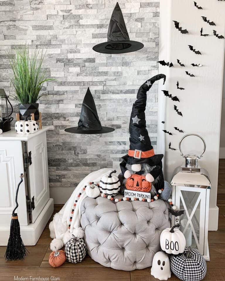 Witch Halloween Decorations Against Stone Wall