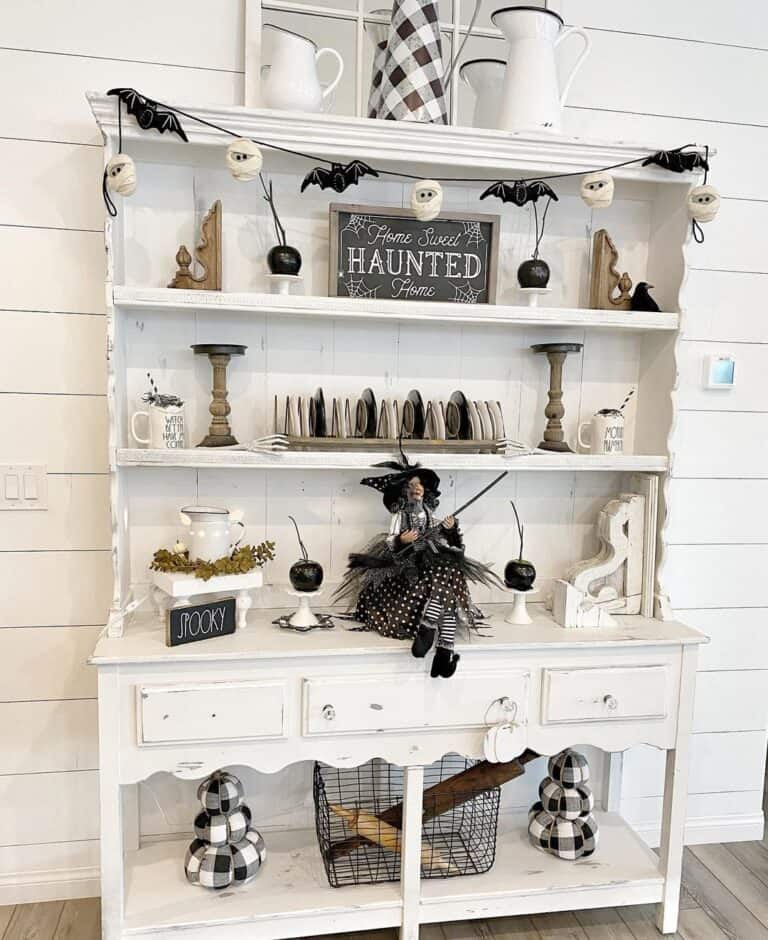 Witch Halloween Decorations on Baker's Shelf
