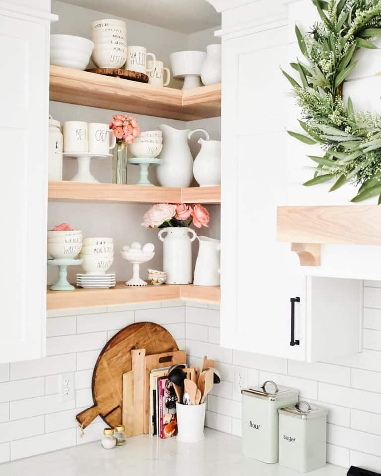 Wood Floating Shelves Next to White Cabinet