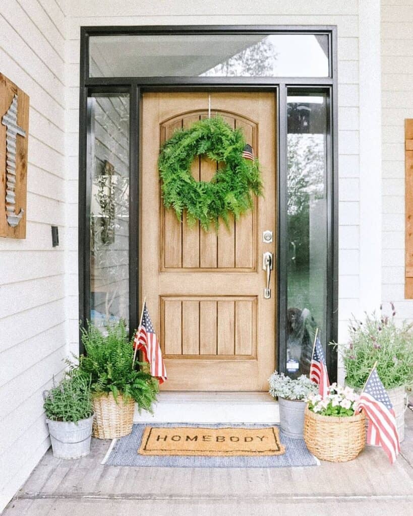Wreath on a Wood Front Door With Sidelights and Transom