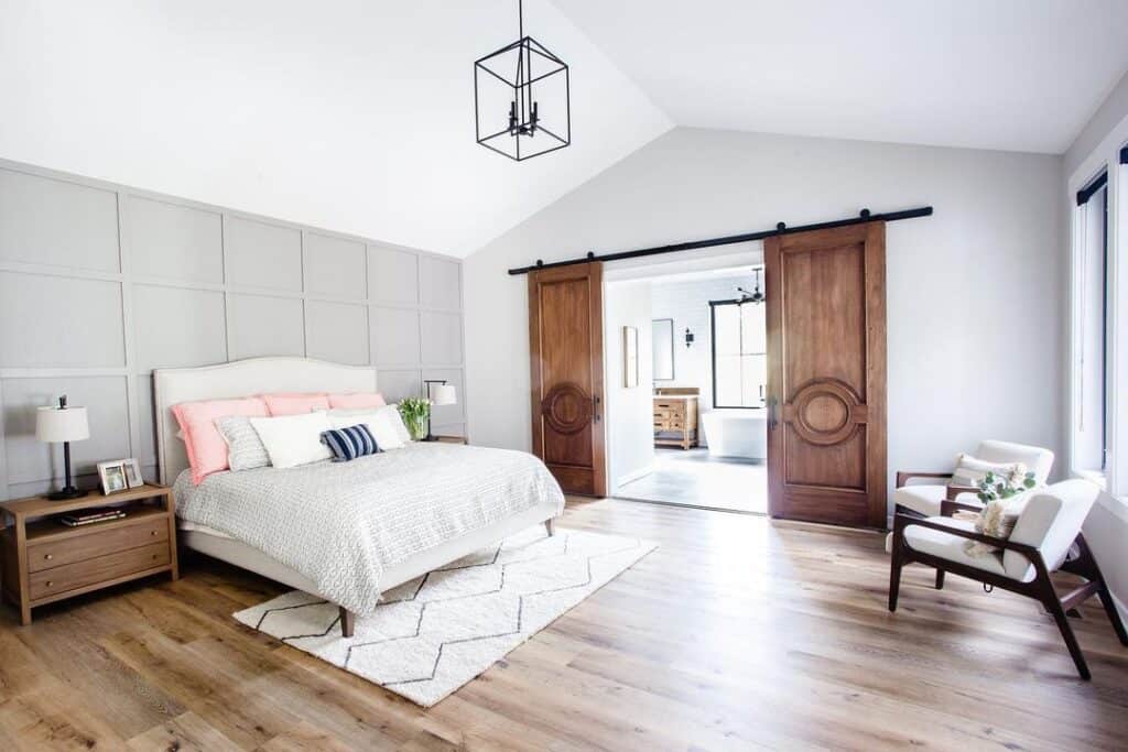 Bedroom with Vaulted Ceiling and MIllwork Feature Wall