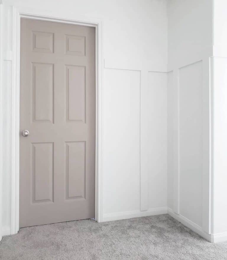 Beige 6-Panel Bedroom Door with Gold Doorknob