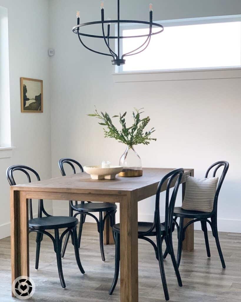 35 Dramatic Black Wood Dining Chairs That Make a Statement