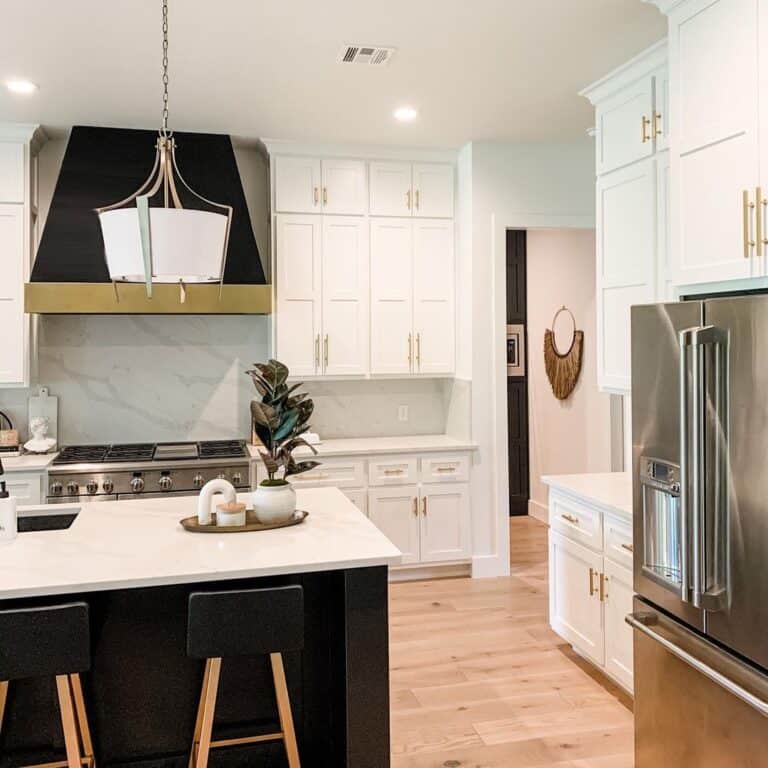 Black Accents in White and Gold Kitchen