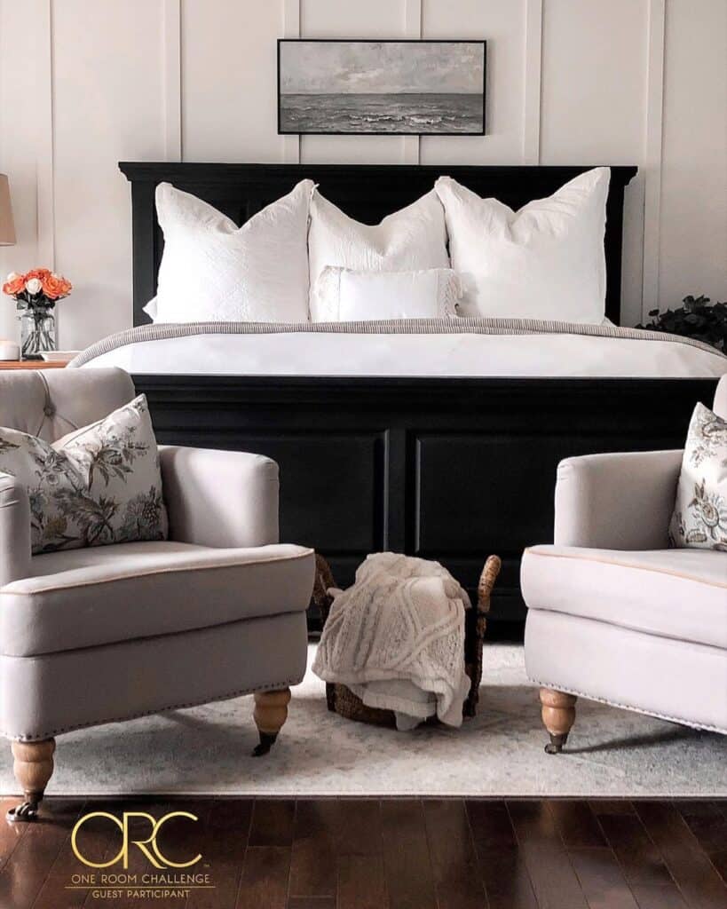 Black Bedframe and Identical Beige Armchairs