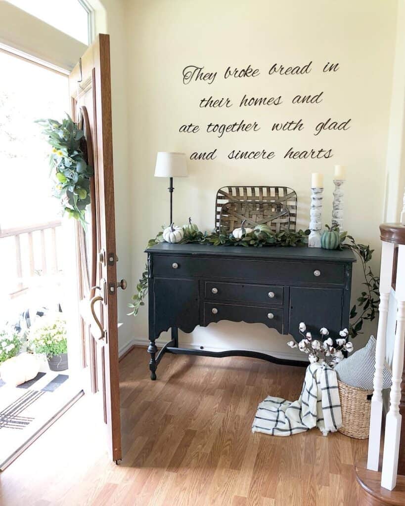 Black Buffet With White Knobs in Entryway