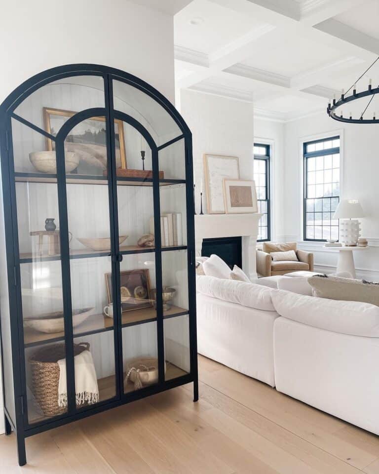 Black China Cabinet and a White Sofa
