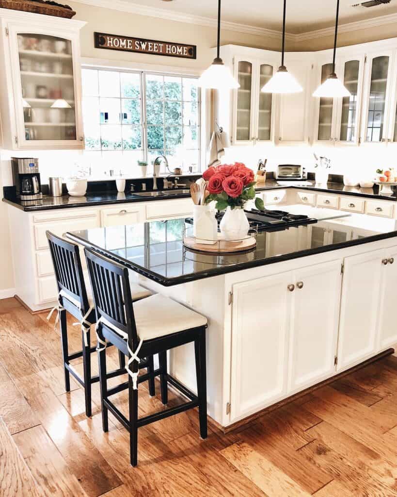 Black Countertop on White Kitchen Island Soul & Lane