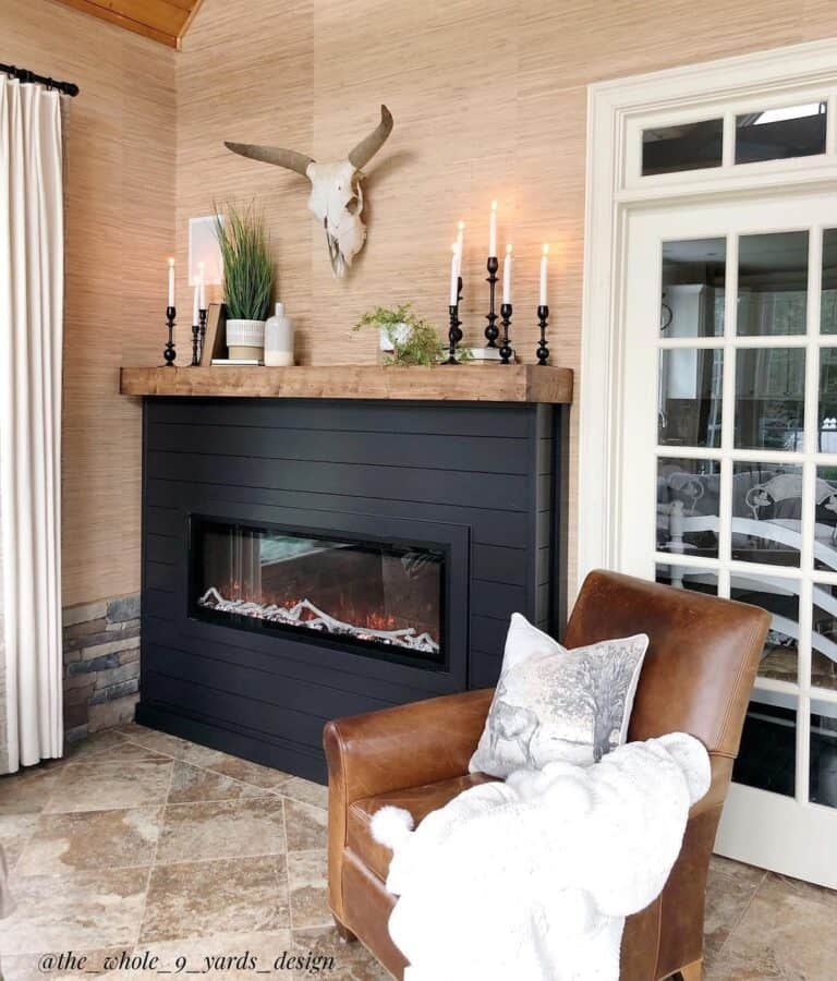 Black Electric Fireplace with Candlelit Mantel